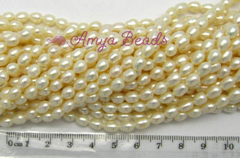 Freshwater Pearls ~ Oval 5-6mm WHITE x 65